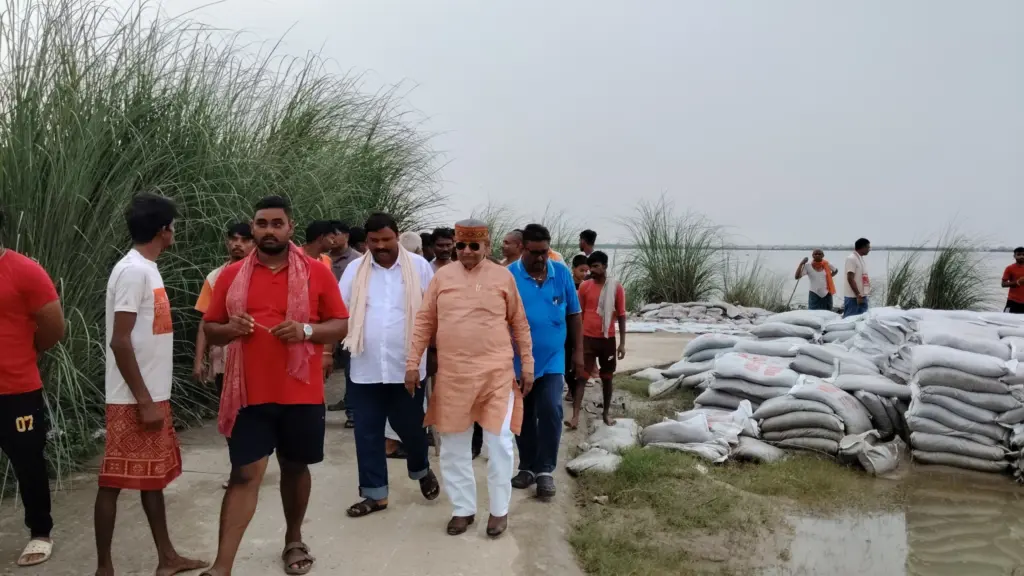 Raghvendra Pratap Singh inspecting flood-affected areas and interacting with locals